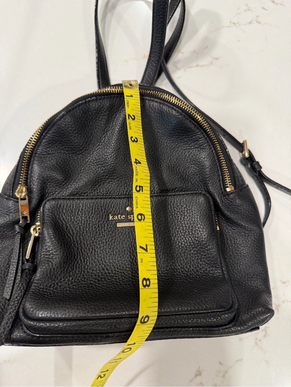 Kate Spade Black Pebbled Leather Backpack with Gold Hardware Striped Interior - Picture 9 of 9